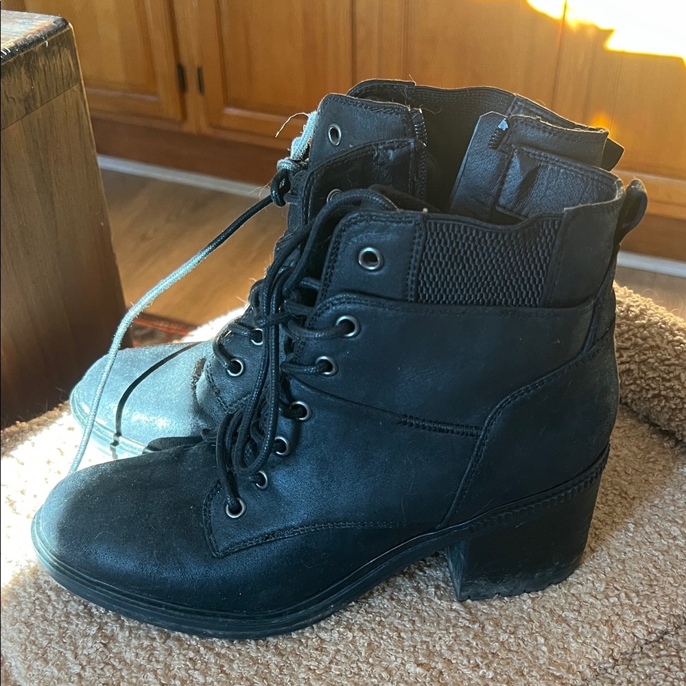 Heeled combat boots in soft black suede/leather